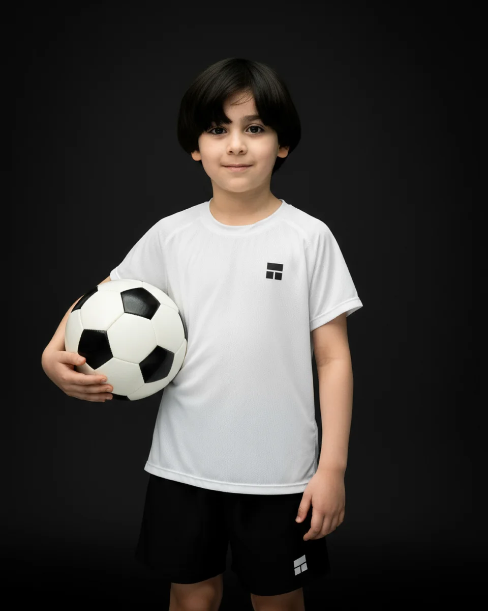 Courts 35% campaign — Kidswear / white shirt and football
