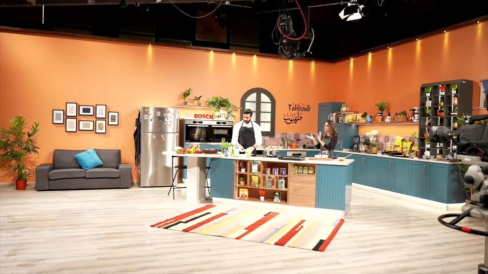 Film still at 103.25s. TWI — Building the Television Kitchen.
