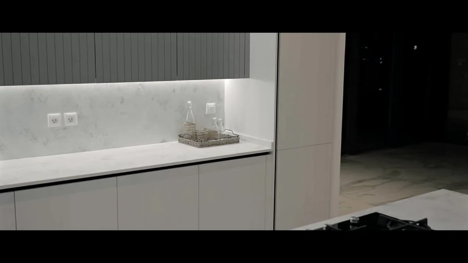 Tahboub Home — Sculpted Grey Kitchen. Film still at 13.63s.